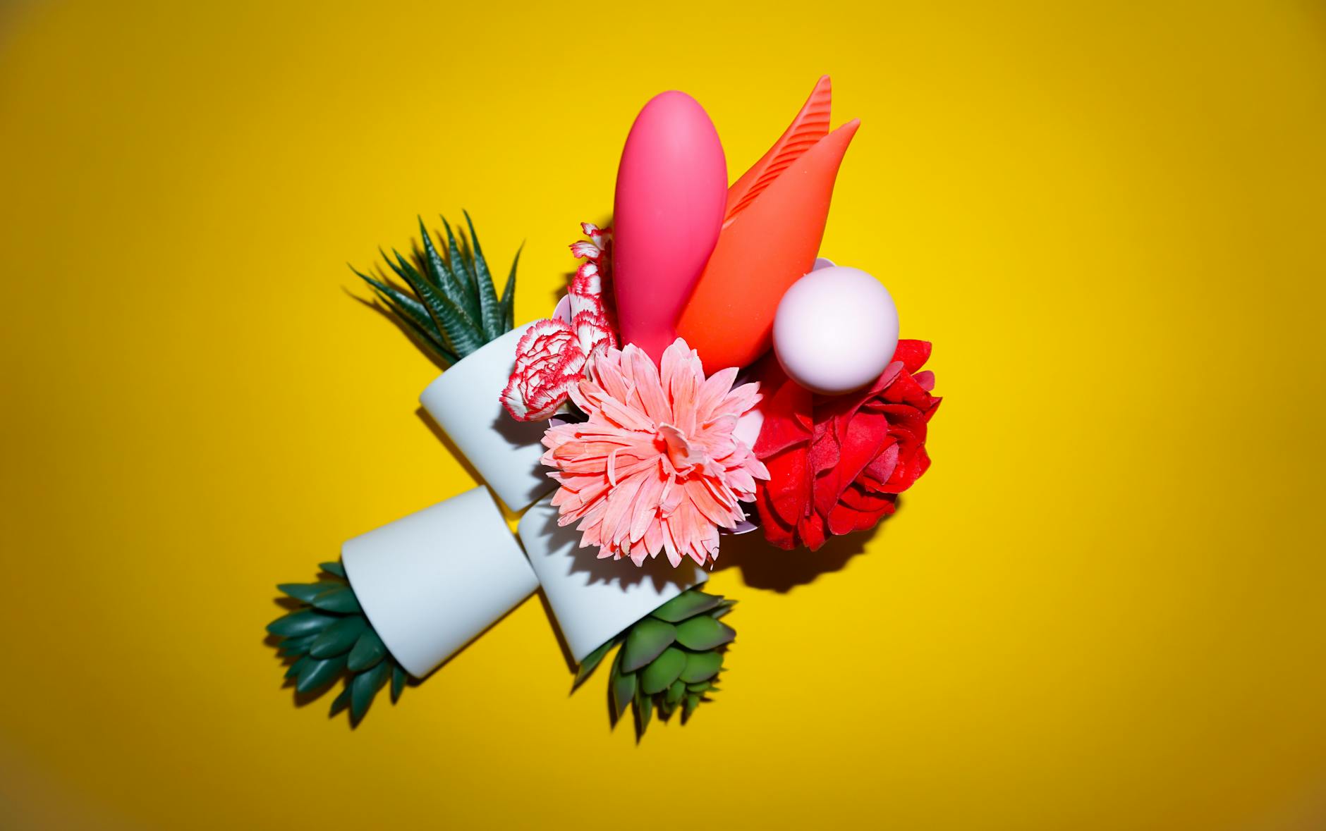 Two vibrant lemons on a minimalist white background, representing fresh approaches to couples intimacy